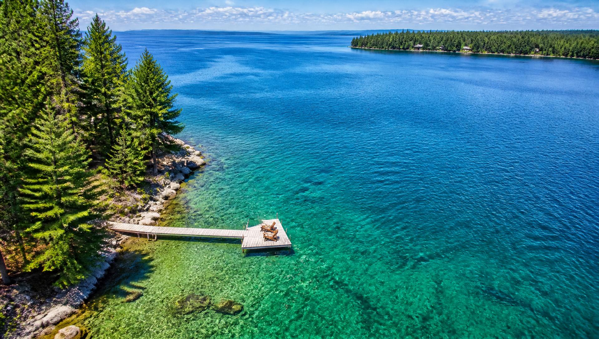 Crystal clear Northern Michigan lake with dock
